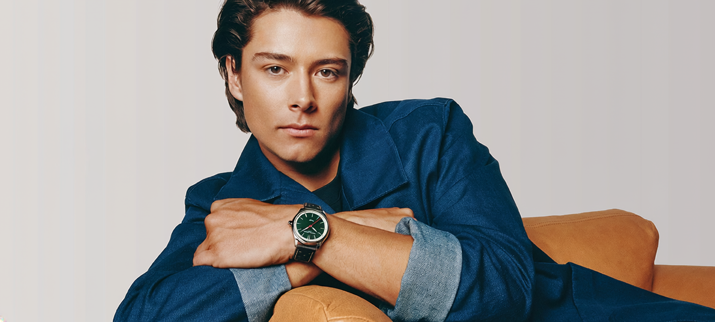 Citizen campaign portrait with green-dial watch
