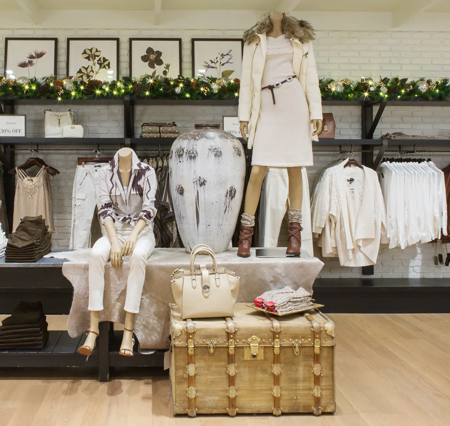 Ralph Lauren store interior tableau with mannequins, vessel and trunk