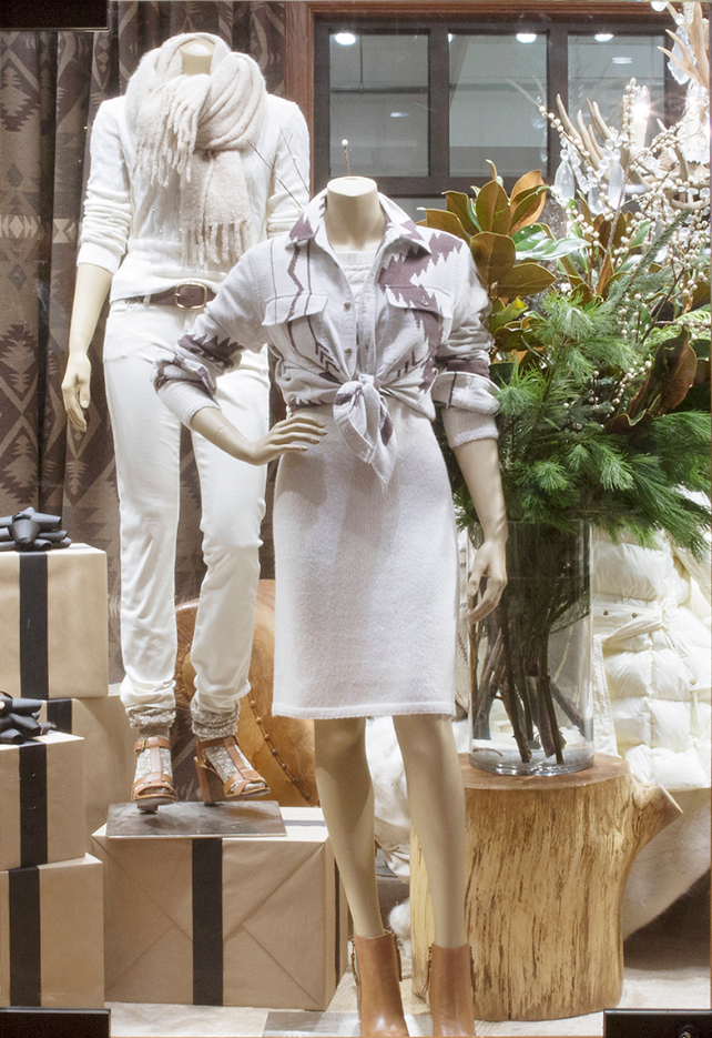 Ralph Lauren Harriman holiday window display with mannequins and gift boxes